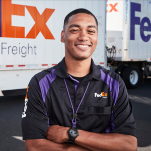 Fedex Employee smiling with arms crossed
