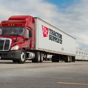 A Tractor Supply delivery truck in a parking lot