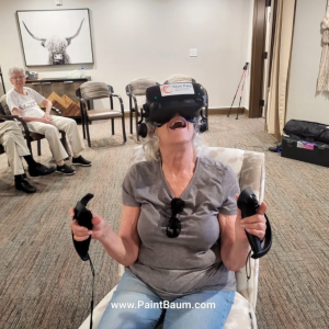 senior citizen woman playing VR