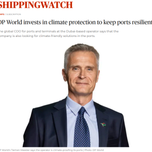 Portrait of Tiemen Meester, DP World's Global COO for Ports & Terminals, wearing a navy suit and blue tie, as featured in a ShippingWatch article about the company’s investments in climate protection and port resilience.