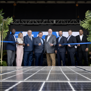 Eaton Arecibo employees cutting ribbon