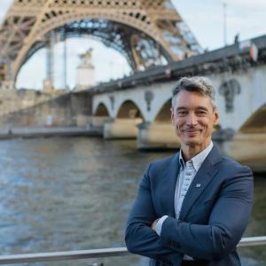 A person stood with their arms folded 