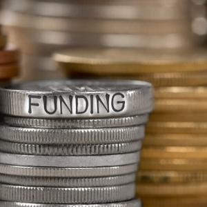 Funding image of stacks of coins.