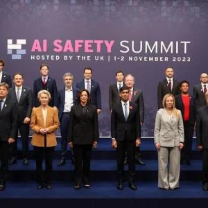 Group of people standing at the AI safety Summit