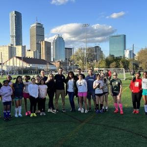 Soccer Unity Project team shown on their playing field in Boston, MA.