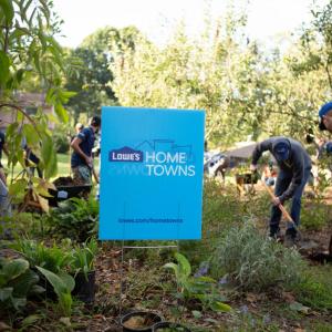 Photo of people working in a garden