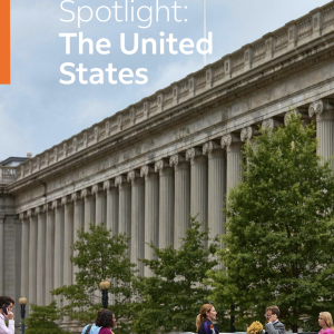 "Spotlight: The United States" with people crossing a street