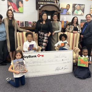 (from left) Springfield Boys & Girls Club board member Aleana Laster; KeyBank Corporate Responsibility Officer Analisha Michanczyk, Branch Manager Vanity Bryant; SBGC Director of Development Karen Natsios;  KeyBank Area Retail Leader Sarah Germini; and Springfield Boys & Girls Club Executive Director Vinnie Borello (far right), with students in the Brain Gain program.      