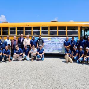 Staff at Prairie Wolf Stuff-the-Bus event