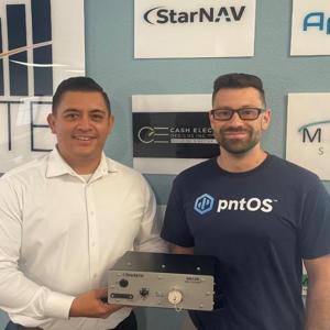 U.S. Bank Business Access Advisor Heli Castaneda holding the StarNav technology with company founder Dr. Joshua Morales at the University of California, Riverside. StarNav is currently housed at ExCITE, joint partnership between UCR, the City of Riverside, and the County of Riverside. This photo was taken at ExCITE.