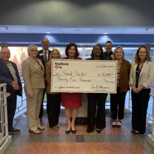 KeyBank and Stark State representatives shown with a $35,000 grant check.