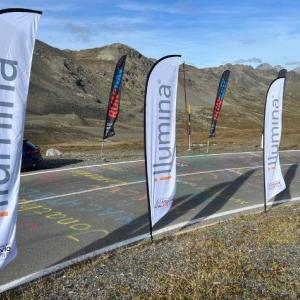 Illumina flags along the road to the summit of Stelvio.