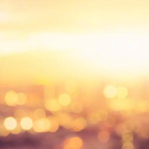 City glowing with golden sunlight.