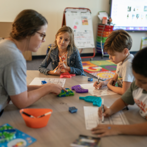 Teacher with 3 students 