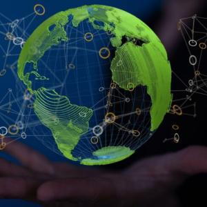 Globe shown in the palm of a hand.