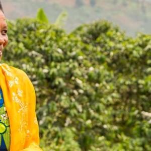 Person smiling while looking into nature
