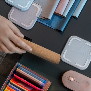 desk with hands and Logitech products shown on top