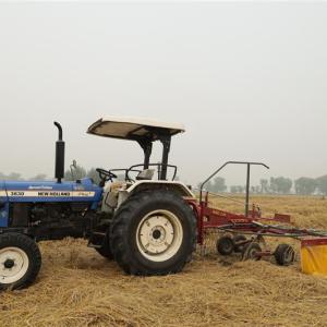 Tractor with rake