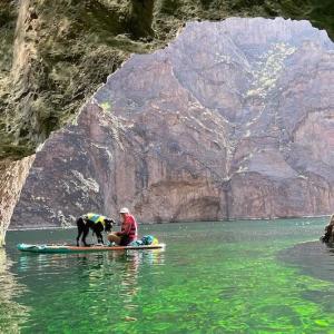 Suzeth Campos boating on a beautiful river.