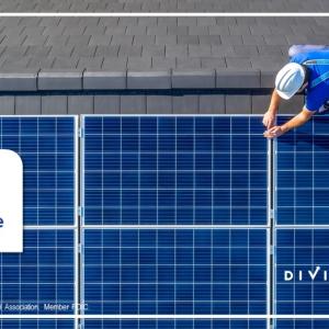 Man working on solar panels