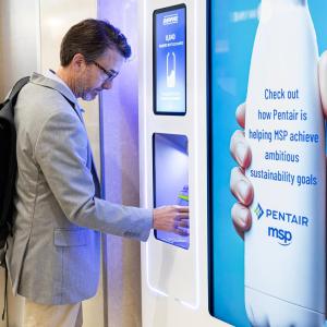 Man filling water bottle