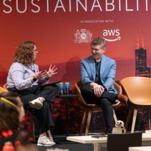 Two speakers in conversation on stage at the Sustainability LIVE Chicago 2025 event.
