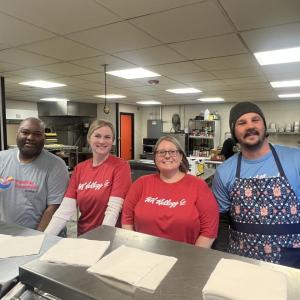 WK employees serving lunch at the Salvation Army 