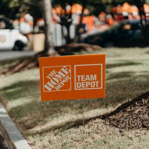 Sign showing The Home Depot and Team Depot.