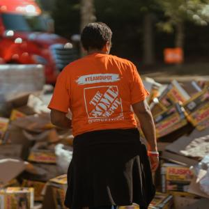 The Home Depot volunteer shown with disaster relief materials.