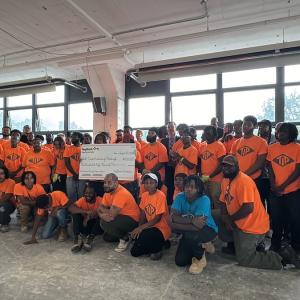 TIP students shown with KeyBank and the grant check.