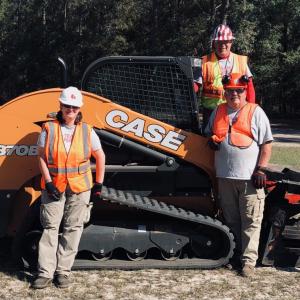 CNH employees with equipment