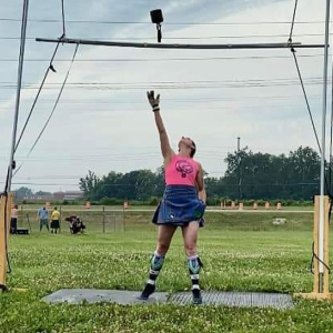 Tara Chippewa competing in the weight throw at the Highland Games.