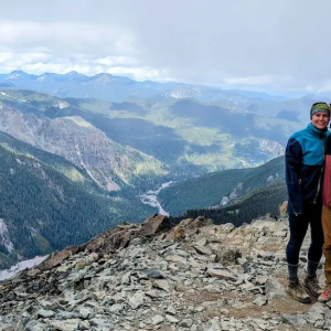 Tareyn Joseph on top of a mountain with her husband.