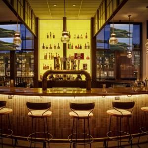 Chairs in front of a bar