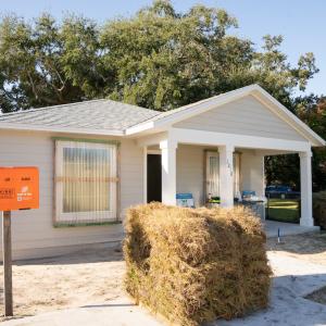 House shown with the lawn to be installed.