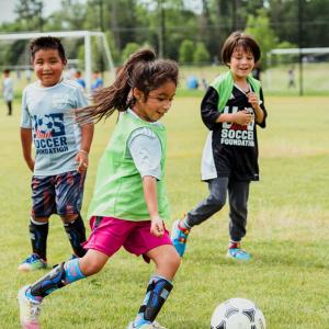 children playing soccer