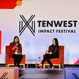 Tenwest Impact Festival;  GoDaddy’s Sr. Director of Venture Forward, Alexandra Rosen shown on stage.