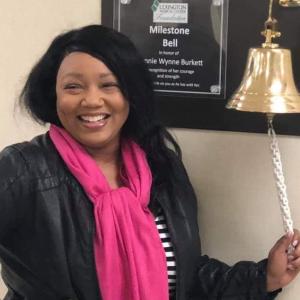 Teosha Harrison ringing the I beat cancer bell. 