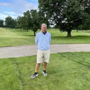 Terry Gwinn outside at golf course