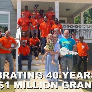 Celebrating 40 Years with $1 Million Grant. Team Depot shown in front of a house.