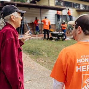 The Home Depot Foundation volunteers work on a house.