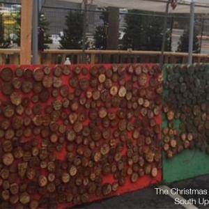 The Christmas tree stump wall at the South Upland, California, store.