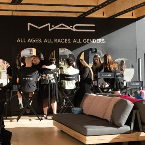 makeup chairs with people surrounding them