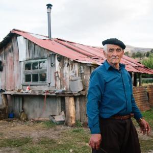 Thomas Allison photograph of a man wearing a beret.