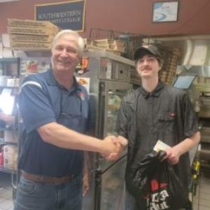 Tom Wyczawski with one of Tasty Hut LLCs family members.