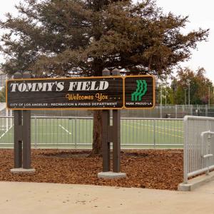 The official City of Los Angeles Parks sign displays "Tommy's Field" outside of the pitch. 