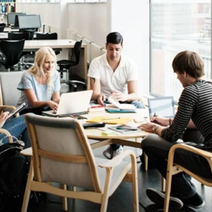 4 people meeting at a table