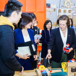 Otis Chair, CEO & President Judy Marks tours a youth innovation zone made possible by the China Soong Ching Ling Foundation. The non-governmental organization and Otis announced a partnership that will deliver scholarships to outstanding female university students with a focus on Science, Technology, Engineering and Math (STEM). The funding will also support STEM innovation programs for youth