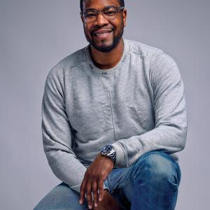 Sean Tresvant sat on a stool