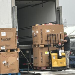 Gleaners employee loads cereal into semi 